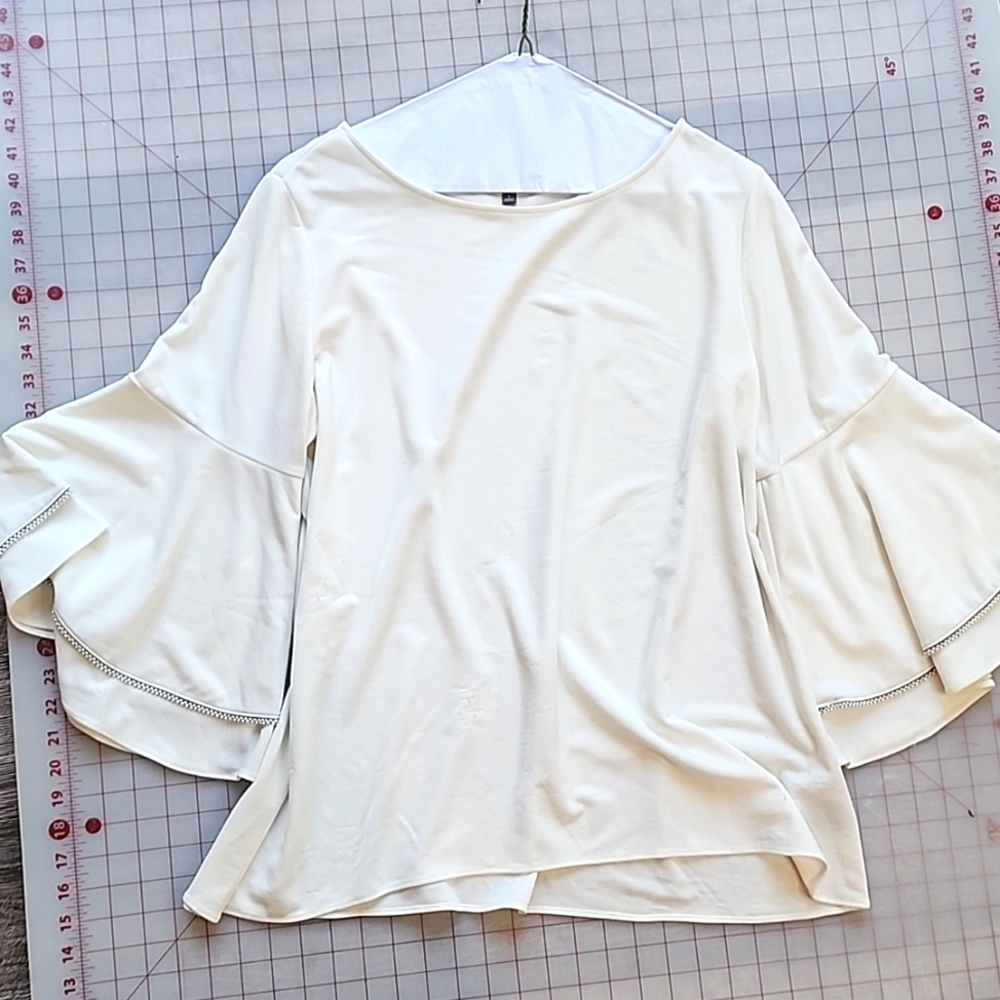 The Limitted Strechy white Top pleated bell Arms blouse to